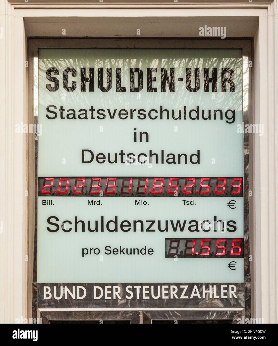 clock indicates the actual debt in Germany Stock Photo