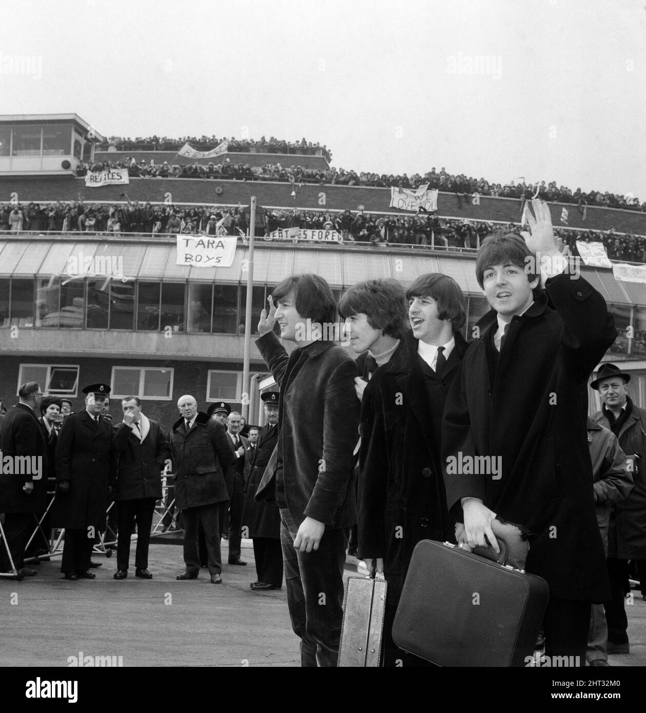 The Beatles fly off - to tears 22nd February 1965. 'Come back soon, we love you' cried the girls as John, Paul, George & Ringo boarded a Boeing 707 jet liner at London Airport.  The fans, more than 1,400, sang fairwell messages to the tunes of Beatles hit records as the plane lifted off the runway, bound for the sunny Bahamas, where the Beatles are to make their second film, Help! Stock Photo