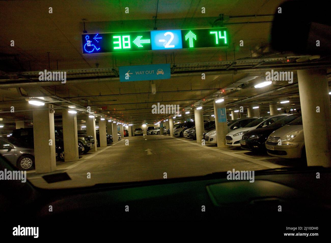 Driving in to an under ground carpark, Uk Stock Photo