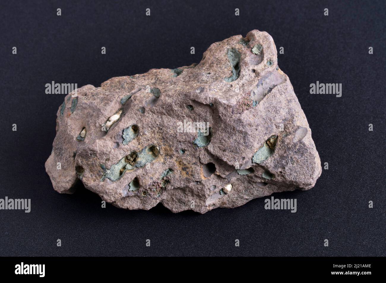 Green Earth on Amygdaloidal Basalt, Pune, Maharashtra, India Stock Photo