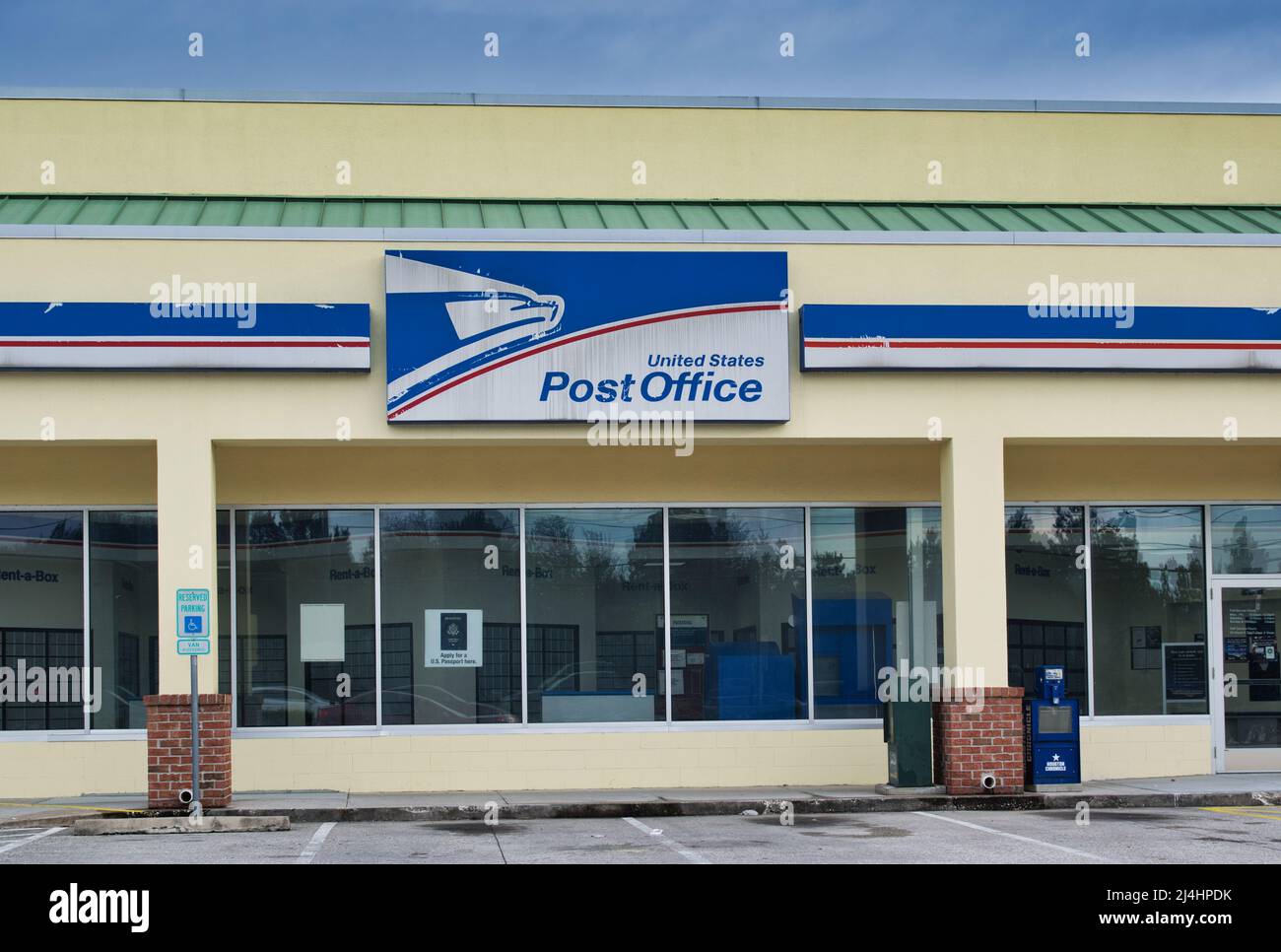 Houston, Texas USA 12-03-2021: USPS storefront in a Houston, TX location. United States Postal Service was founded in 1971. Stock Photo