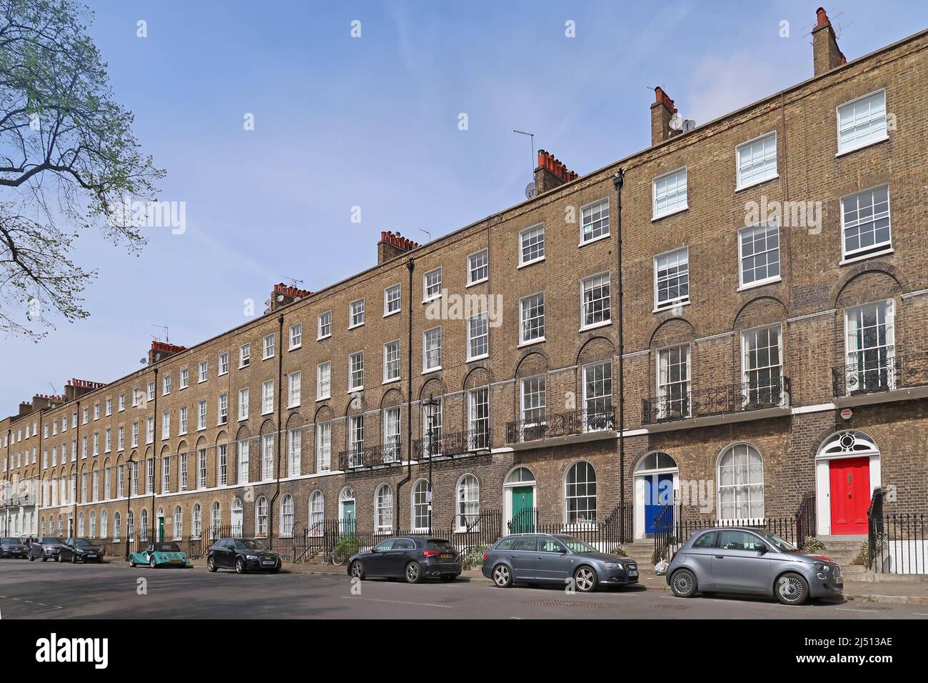 Georgian terraced houses on the north side of Myddelton Square, Islington. One of London's largest and most elegant garden squares. Grade II listed Stock Photo