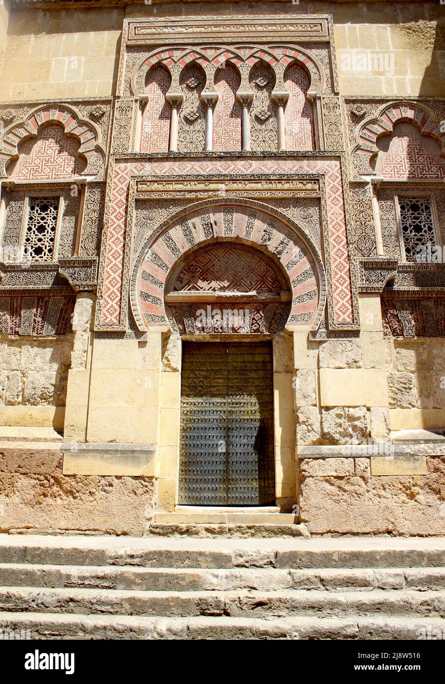 The external walls and doors of the Islamic Mezquita in Cordoba Stock Photo