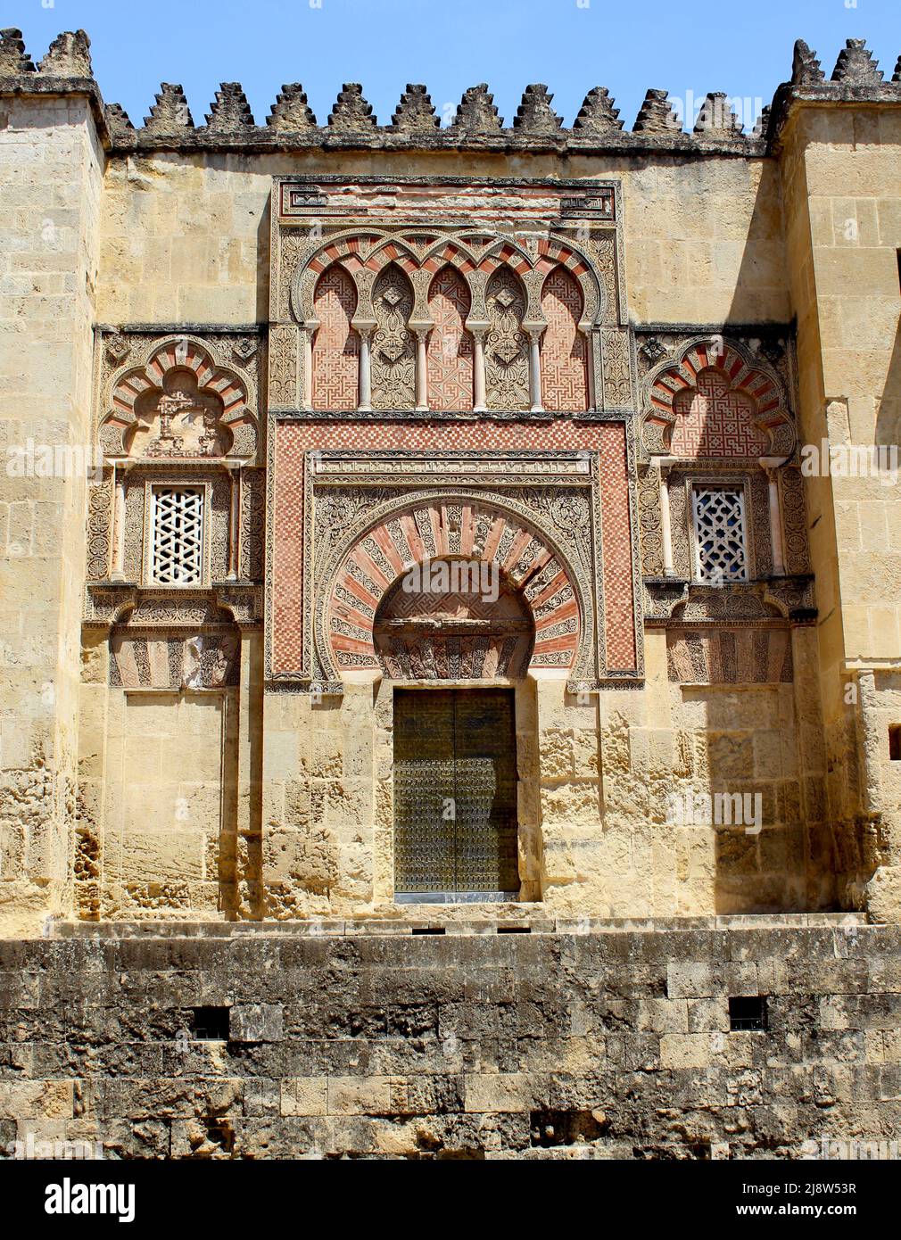 The external walls and doors of the Islamic Mezquita in Cordoba Stock Photo