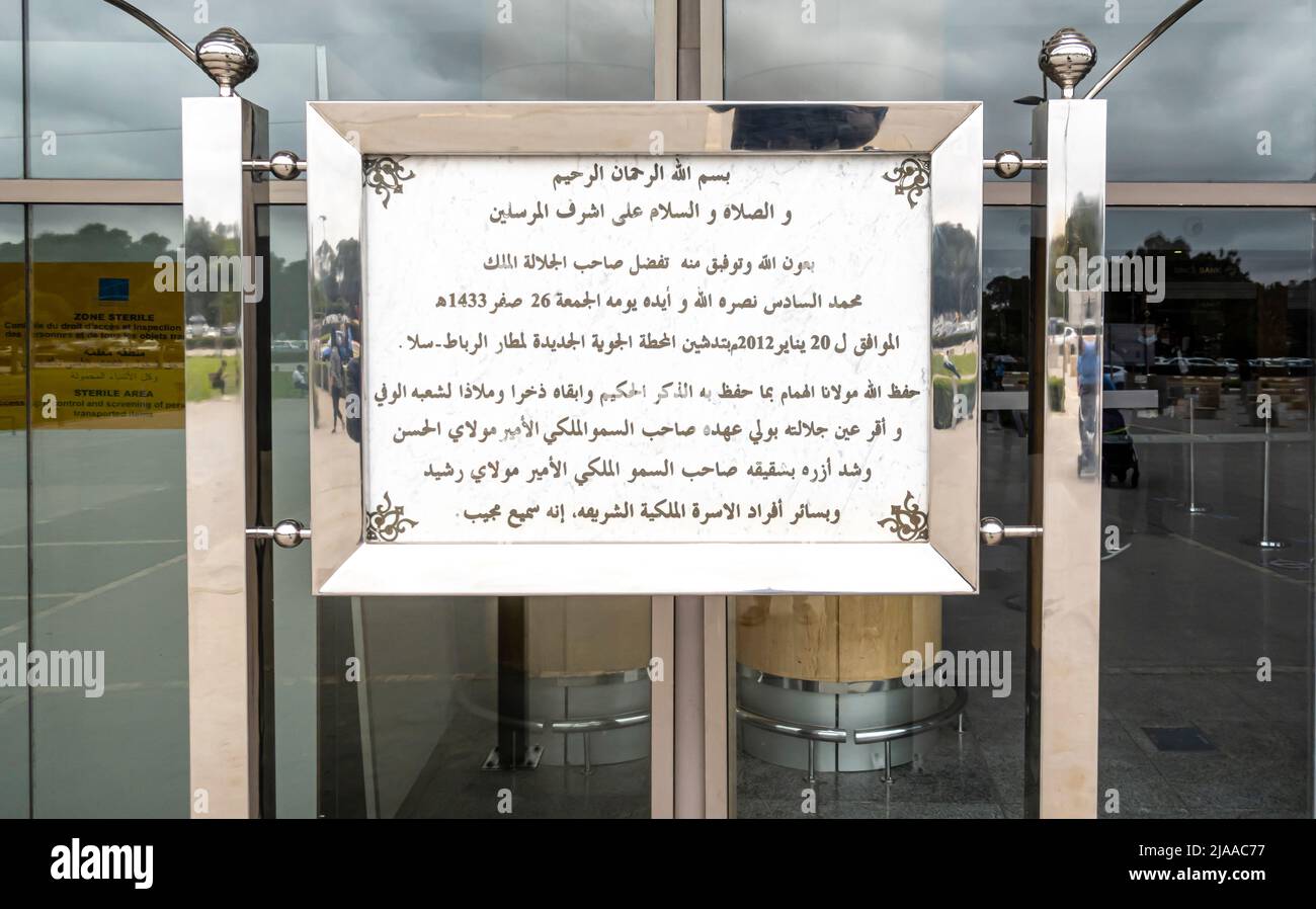 Dedication and praise of King of Morocco in Arabic on the poster sign in front of Rabat Sale Airport, Morocco Stock Photo