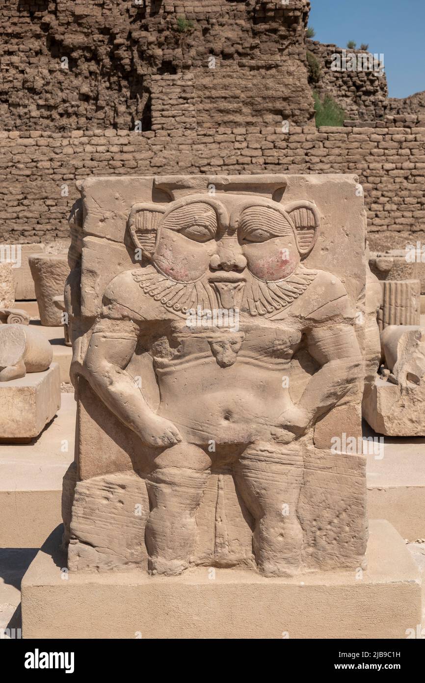 Statue of god Bes In the outer courtyard at Denderah Temple, near Qena, Egypt Stock Photo