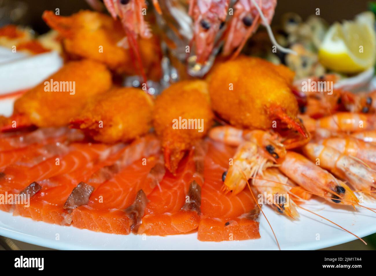 Red fish and boiled crayfish as an appetizer for beer. Stock Photo