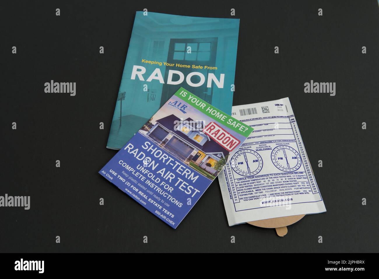 An at home, do it yourself radon testing kit with the informational material on radon and how testing works. Stock Photo