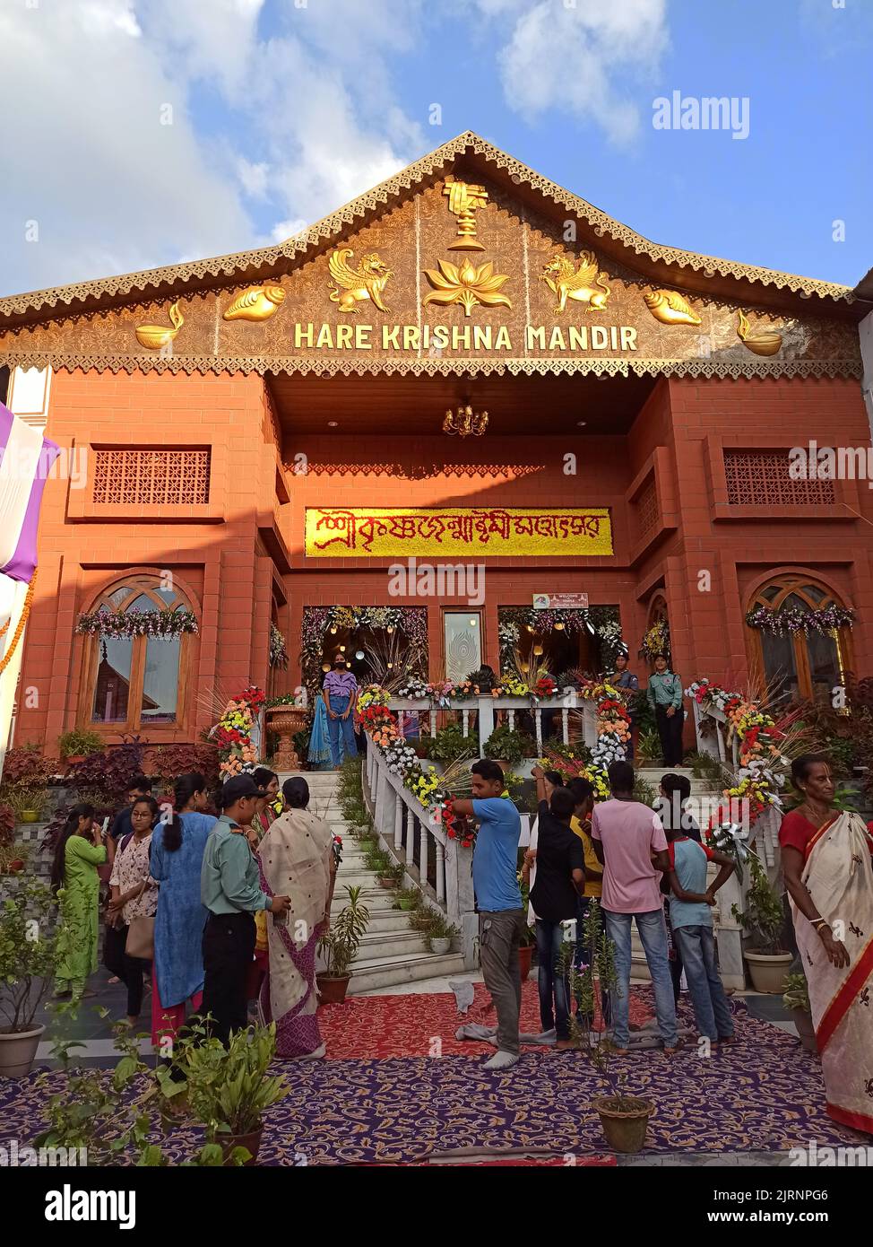 People gathered at Hare Krishna Mandir during Krishna Janmashtami, an annual Hindu festival that celebrates the birth of Krishna Stock Photo