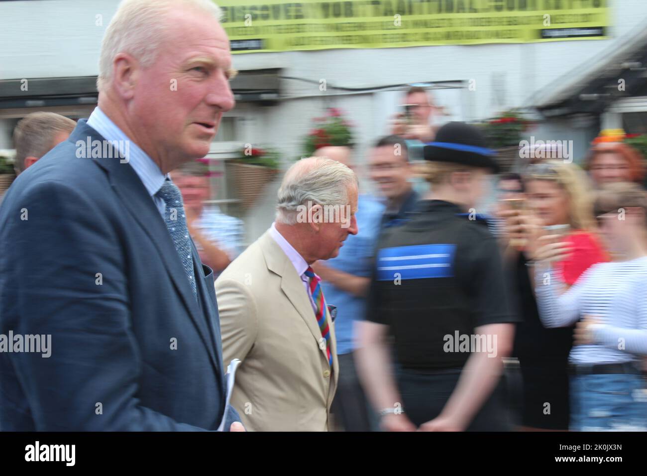 Charles the Prince of Wales visits North Wales and calls in a local pub and has a quick pint Stock Photo