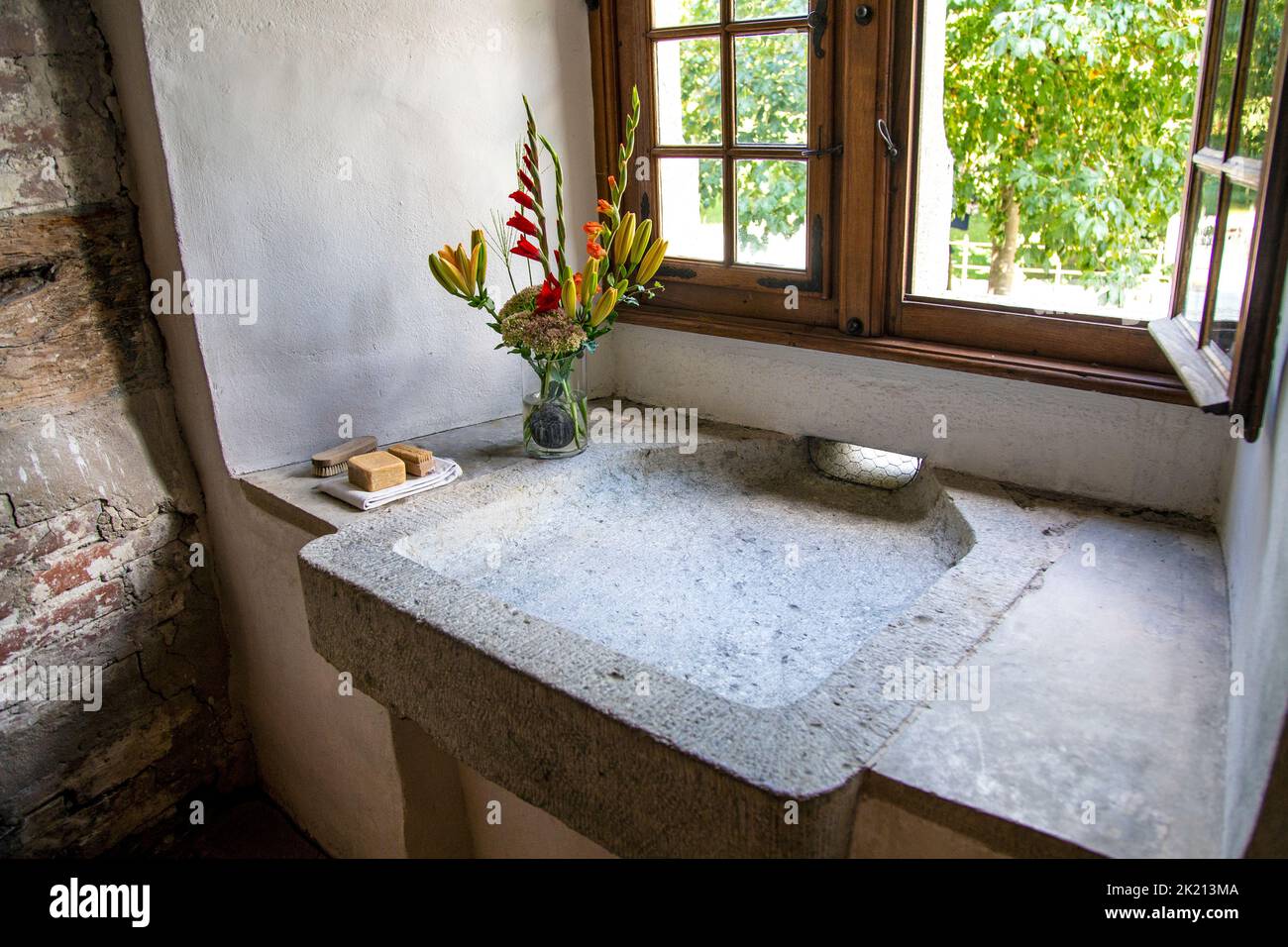 Stone basin inside 13th century Castle Hallwyl, Seengen, Switzerland Stock Photo