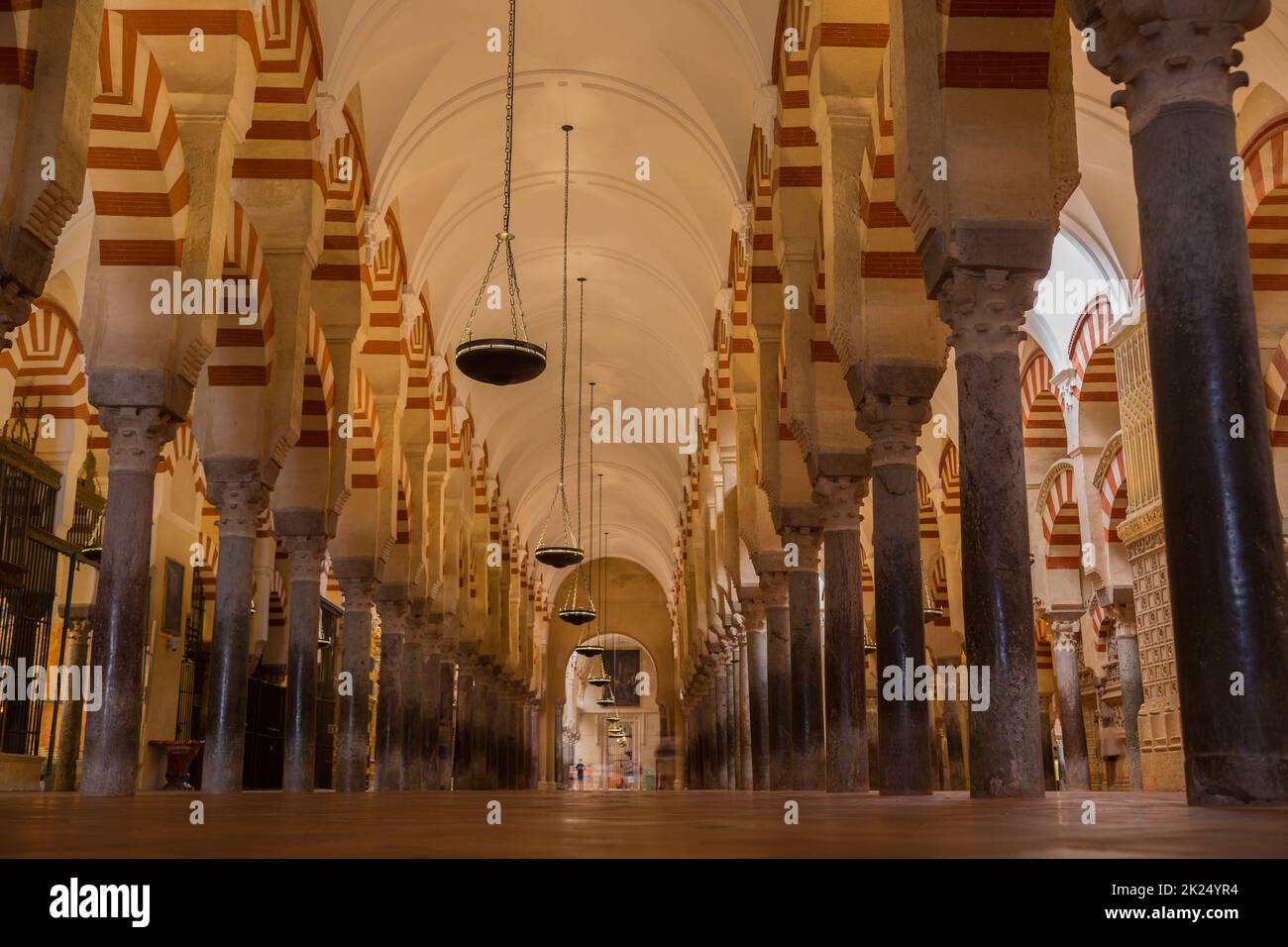 CORDOBA, SPAIN - August 11, 2021 - Arches within the Prayer Hall of the Mezquita (Mosque), Cordoba, Spain Stock Photo