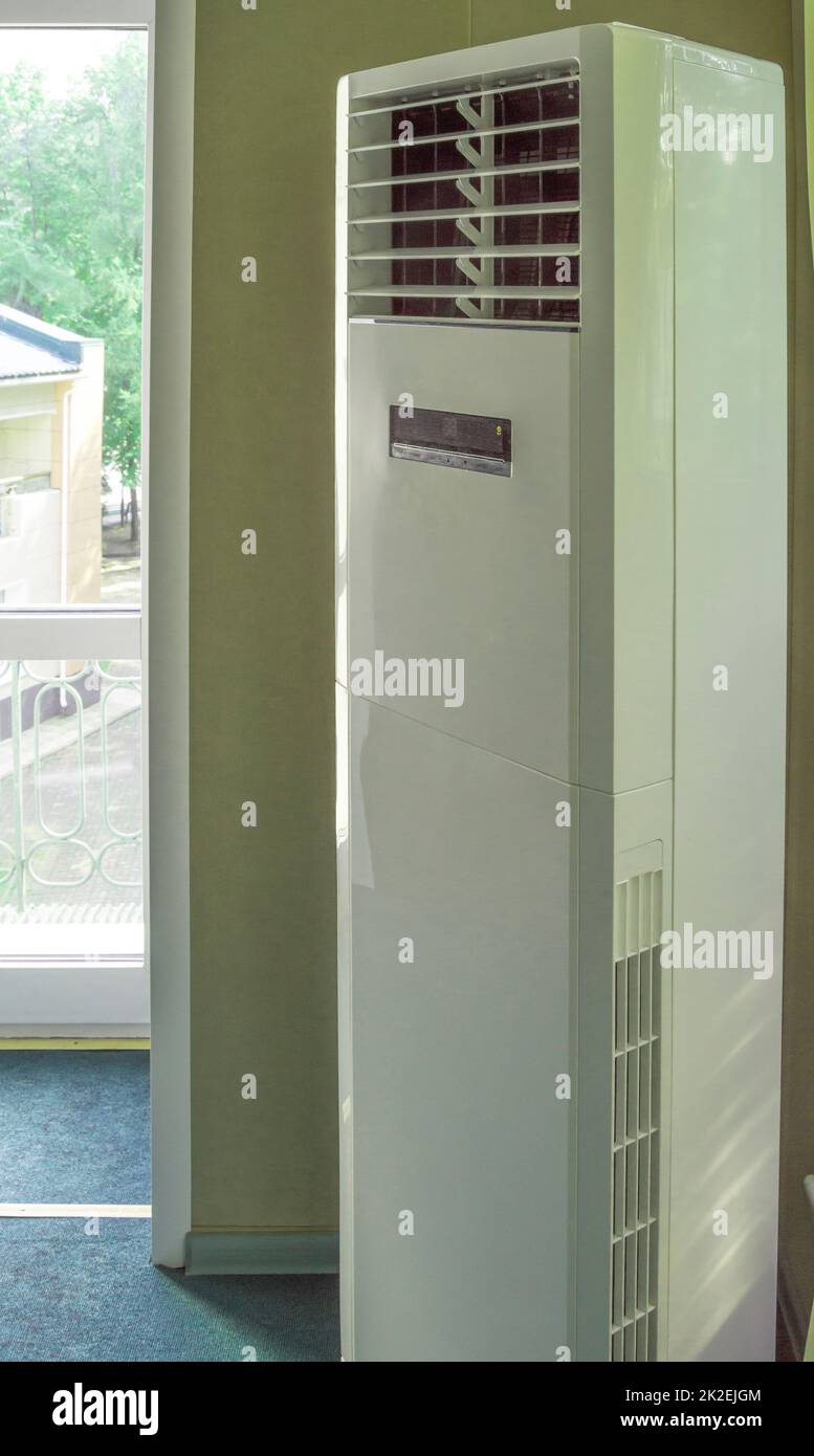 Vertical split system column air conditioner close-up for office, industrial premises and gyms Stock Photo