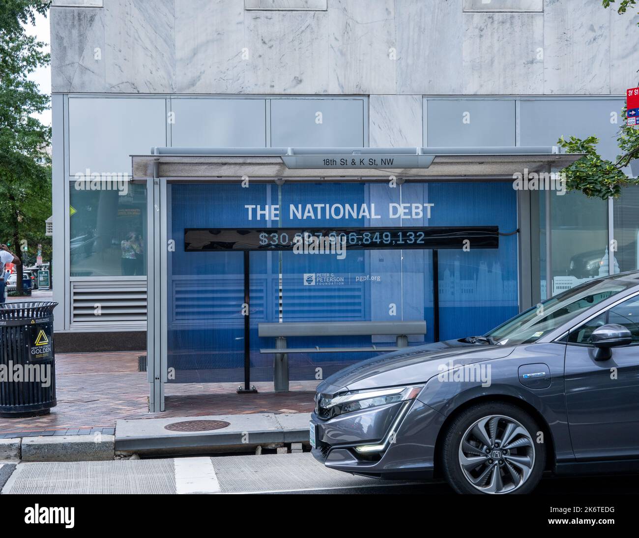 Washington, DC - Sept. 8, 2022: Amount of The National Debt on a bus stop shelter at 18th St and K St. NW. Stock Photo