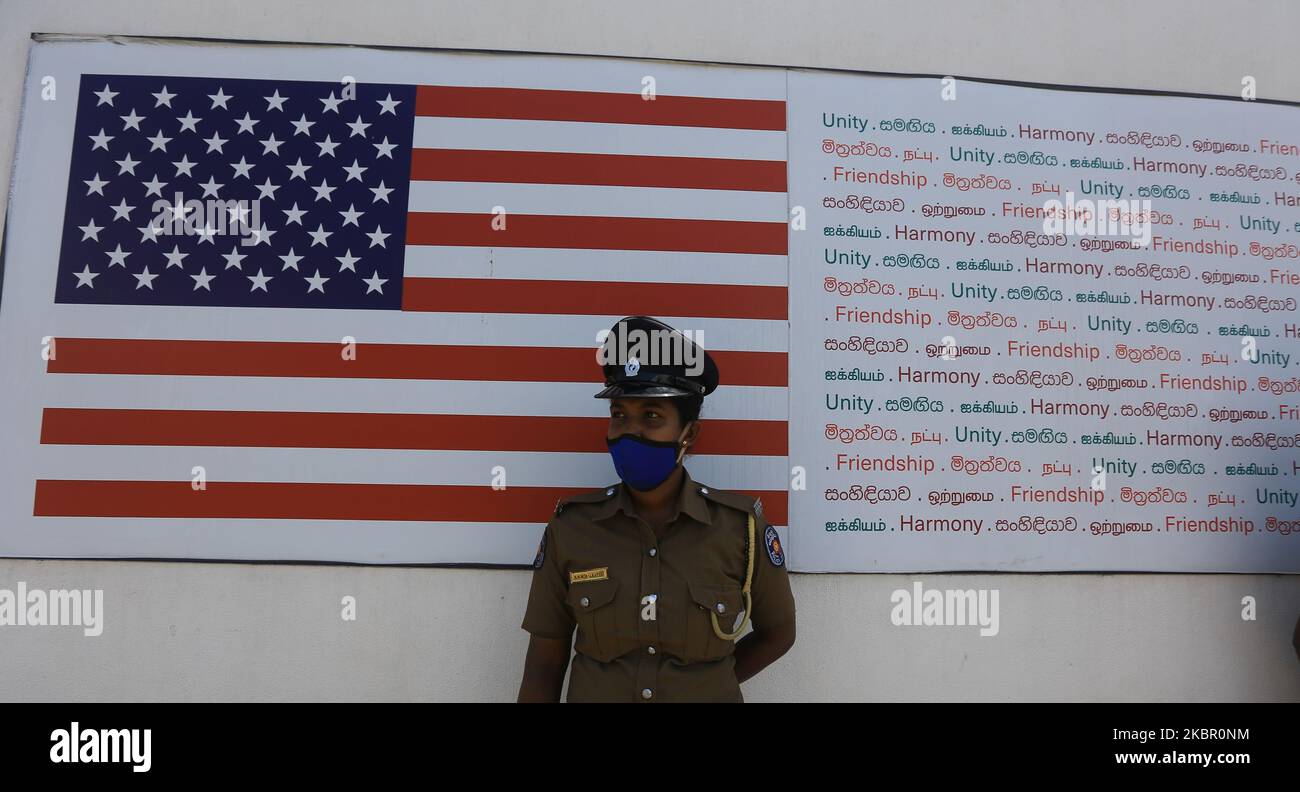 A Sri Lankan female police officer stand outside after stopping a protest against police brutality and the death of George Floyd in front of the United States Embassy In Colombo, Sri Lanka on June 9, 2020. Sri Lanka's Colombo Fort Magistrate's Court had issued an order preventing Frontline Socialist Party (FSP) from holding the protest against the death of George Floyd near the US Embassy in Colombo, Sri Lanka, on 8 June 2020 (Photo by Tharaka Basnayaka/NurPhoto) Stock Photo