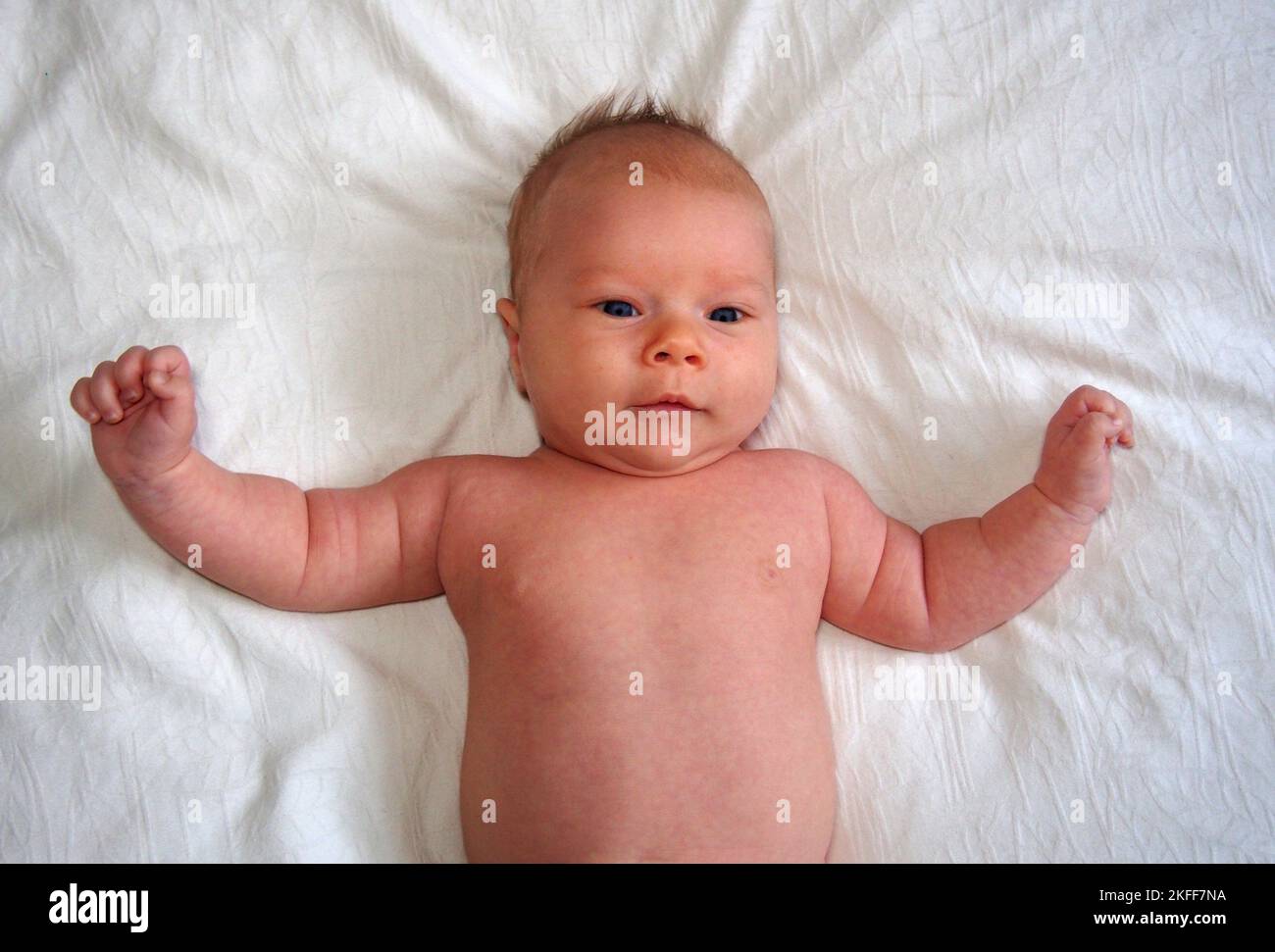 Baby waving arms Stock Photo