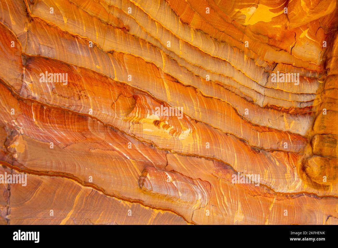 Near view of geological formations building stripes in orange color Stock Photo