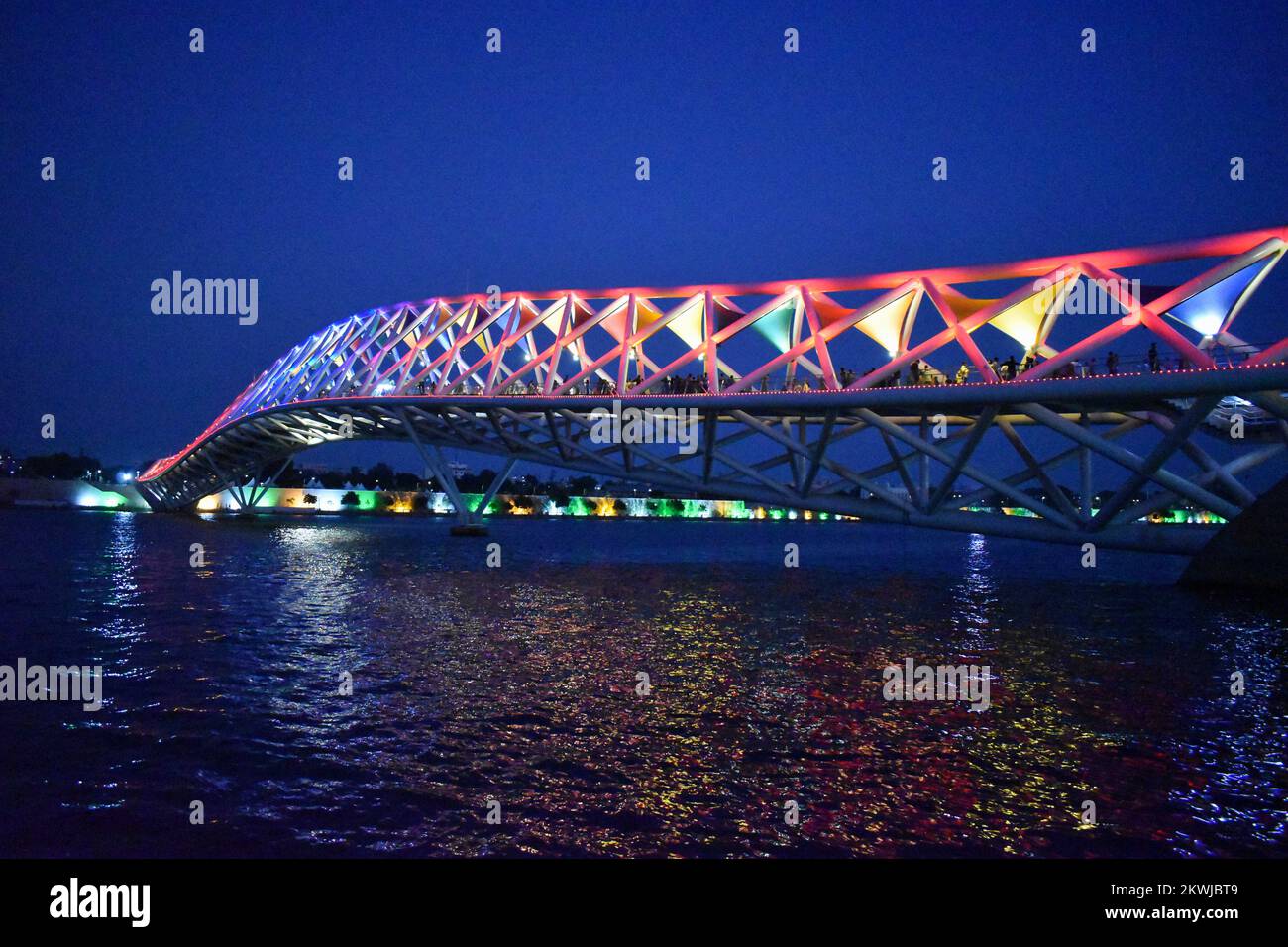 Atal Pedestrian Bridge, a foot-over bridge on Sabarmati river, night view, in Ahmedabad, Gujrat, India Stock Photo