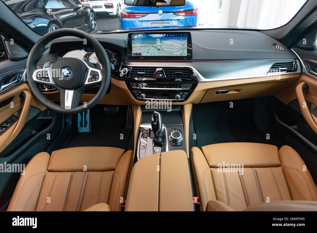 A BMW 530e dashboard view with brown leather Stock Photo