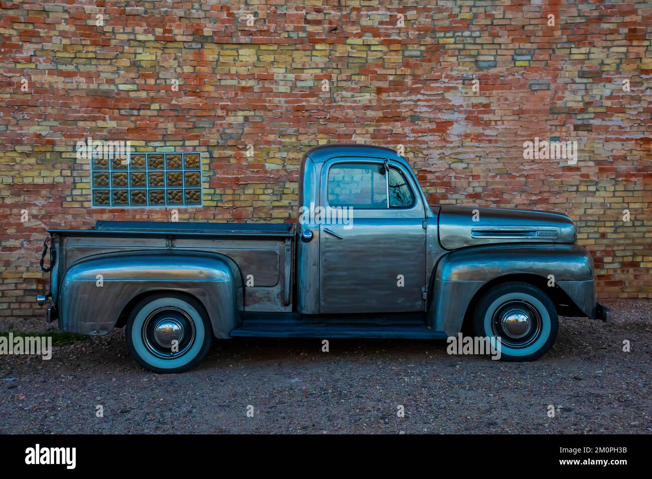 Antique Ford pickup painted to match an Airstream Trailer on Route 66 in Winslow, Arizona, USA [No property release; editorial licensing only] Stock Photo