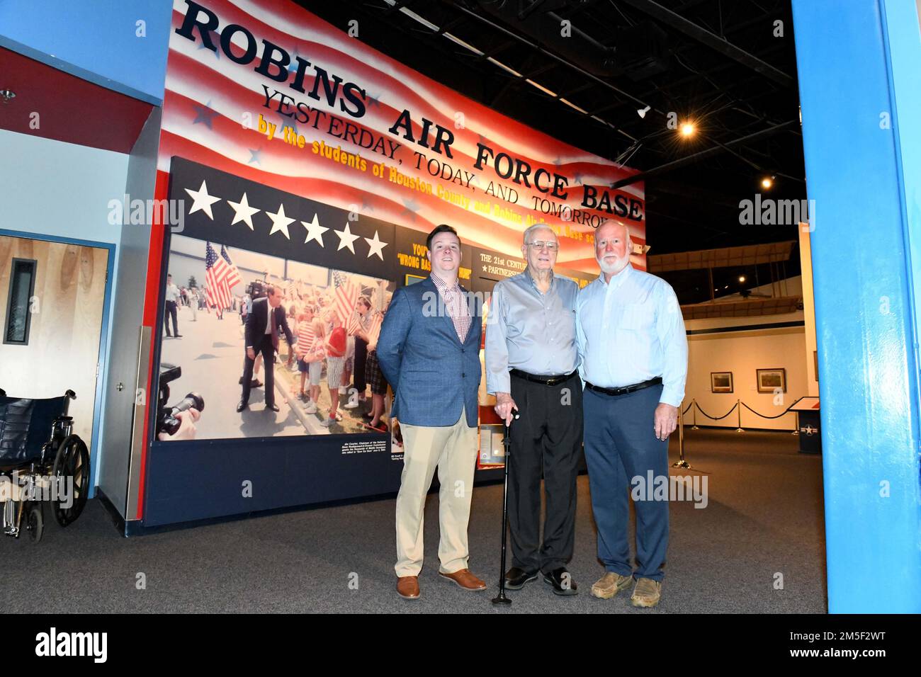 Ryan Arflin, left, Warner Robins Air Logistics Complex Training Data Analysis and Training Modernization specialist, his grandfather G. L. Arflin, center, and father, Steve Arflin, both Robins Air Force Base retirees, visit the Museum of Aviation at Robins Air Force Base, Georgia, March 10, 2022. Four generations of the Arflin family have supported the Air Force sustainment mission at Robins for almost 80 years. Stock Photo