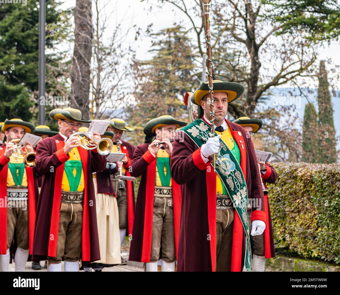 Musicians o the local musical band with their traditional garb - St. Michael  Eppan (San Michele Appiano), Bolzano province, South Tyrol, Italy. Stock Photo