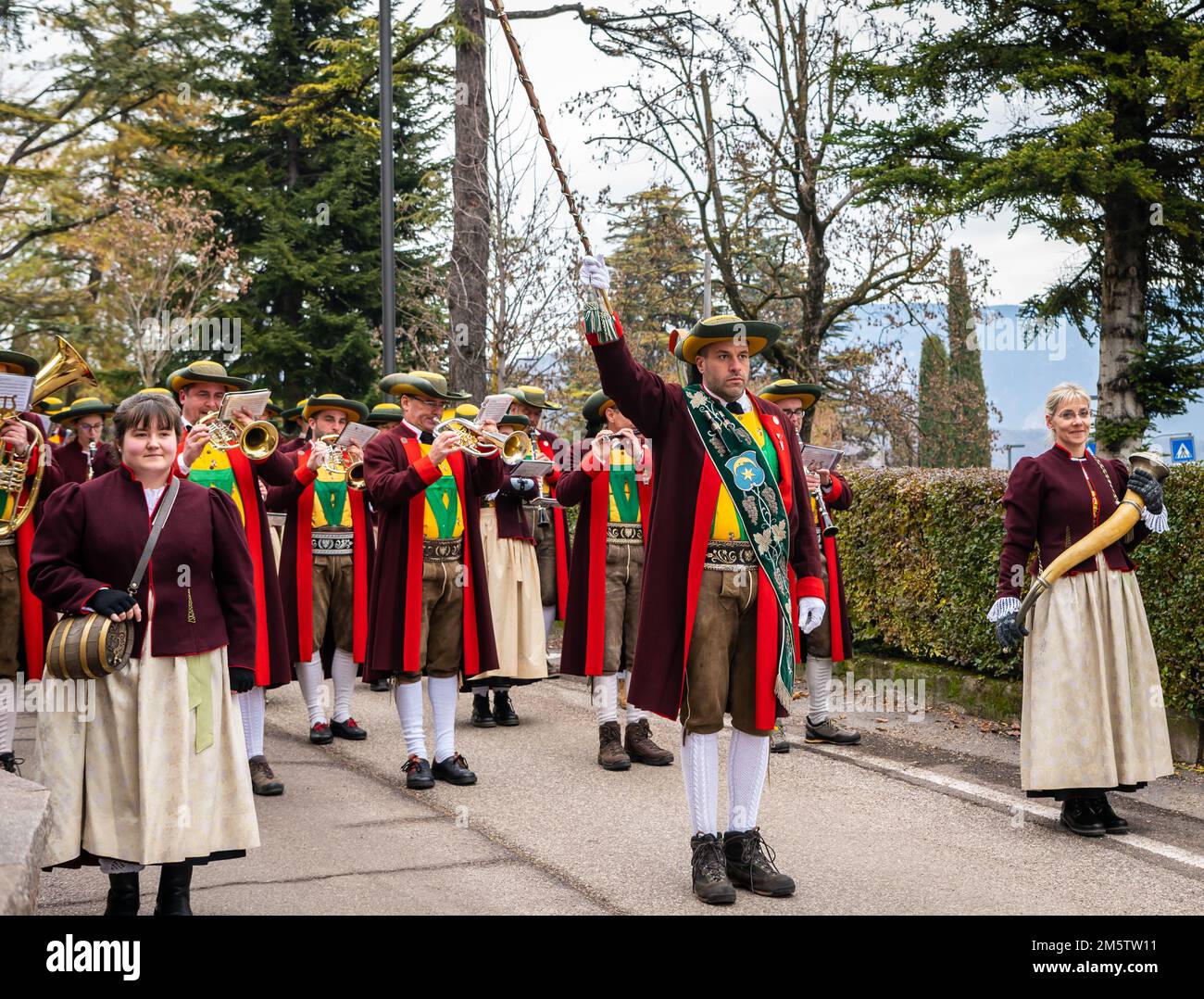 Musicians o the local musical band with their traditional garb - St. Michael  Eppan (San Michele Appiano), Bolzano province, South Tyrol, Italy. Stock Photo