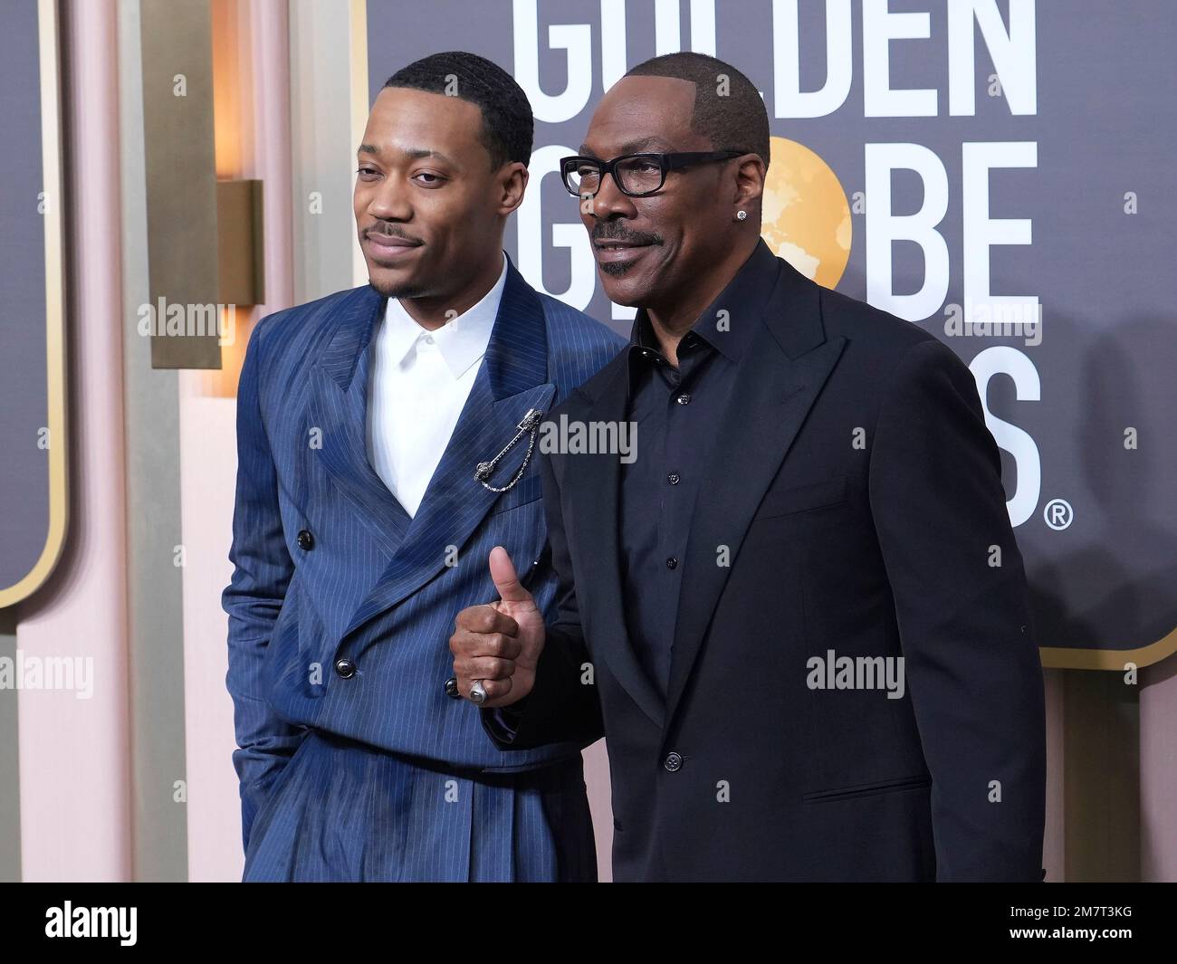 Los Angeles, USA. 10th Jan, 2023. Tyler Williams and Eddie Murphy arrive at the 80th Annual Golden Globe Awards held at The Beverly Hilton on January 10, 2023 in Los Angeles, CA, USA (Photo by Sthanlee B. Mirador/Sipa USA) Credit: Sipa USA/Alamy Live News Stock Photo