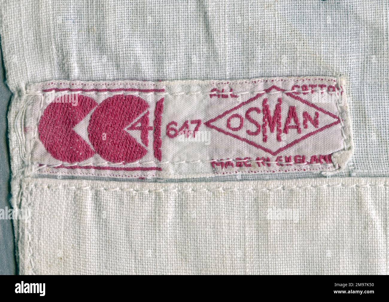 Civilian Clothing utility label inside a cotton garment.  The labelling was introduced during the Second World War to help conserve resources, ensure a reasonable standard of clothing and keep prices down. Stock Photo