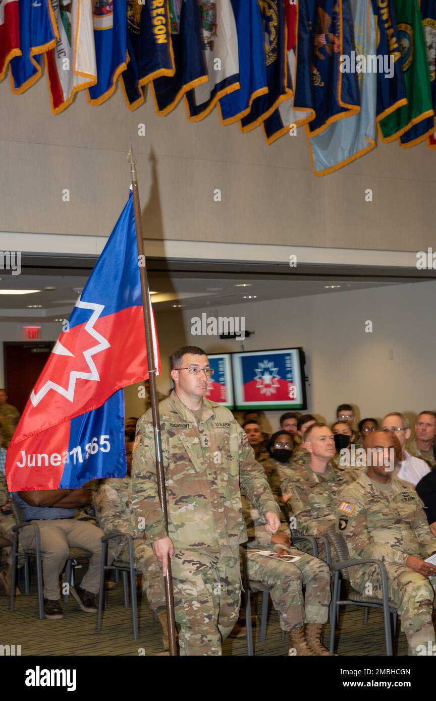 Sgt. 1st Class Andre Toussaint posts the official Juneteenth flag at Patton Hall on Shaw Air Force Base, S.C., June 16, 2022. United States President Joe Biden officially signed the Juneteenth National Independence Day Act into law on June 17, 2021, officially making June 19 a federal holiday in recognition of commemorating emancipation. Stock Photo