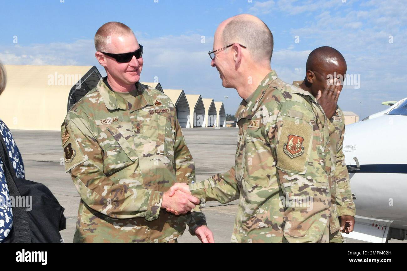 ROBINS AIR FORCE BASE, Ga. – Brig. Gen. Jon Eberlan, left, Warner Robins Air Logistics Complex commander, greets Gen. Duke Z. Richardson, Air Force Materiel Command commander, as he arrives at Robins Air Force Base, Georgia, Nov. 2, 2022. Richardson toured various facilities to observe operations, receive mission updates and recognize personnel for exceptional performances. Stock Photo