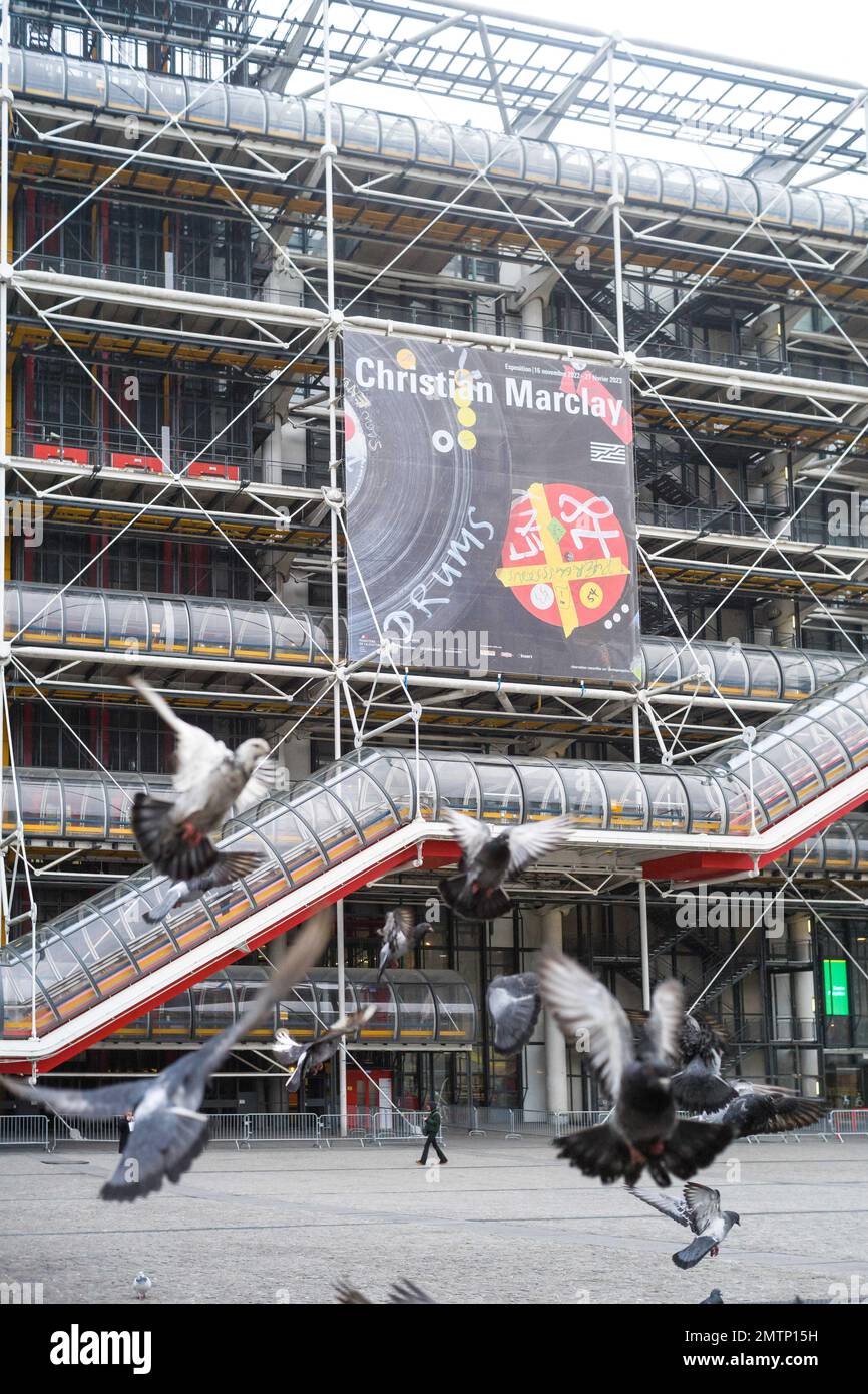 Poster of the exhibition of Christian Marclay on the facade of Beaubourg, Centre Pompidou with in foreground the flight of pigeons. France, Paris on January 22, 2023 Photo by Patricia Huchot-Boissier/ABACAPRESS.COM Stock Photo