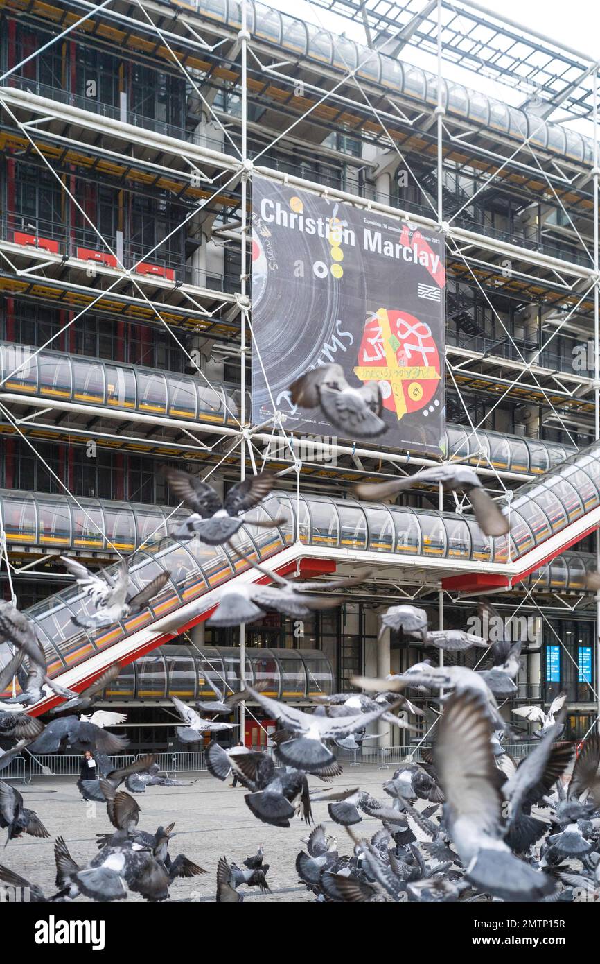 Poster of the exhibition of Christian Marclay on the facade of Beaubourg, Centre Pompidou with in foreground the flight of pigeons. France, Paris on January 22, 2023 Photo by Patricia Huchot-Boissier/ABACAPRESS.COM Stock Photo