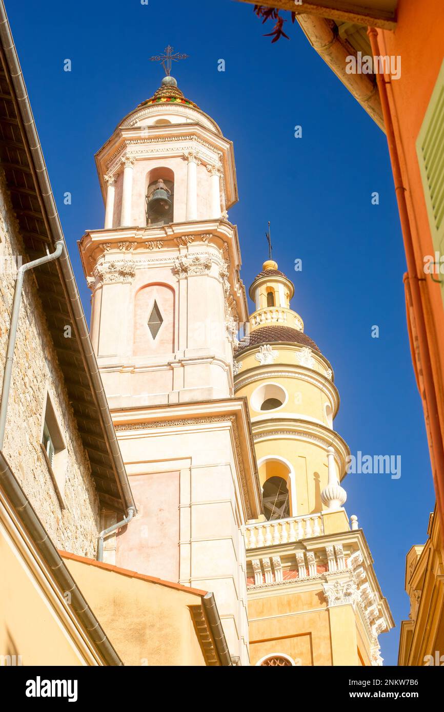 Two colored bell towers in Menton, France Stock Photo