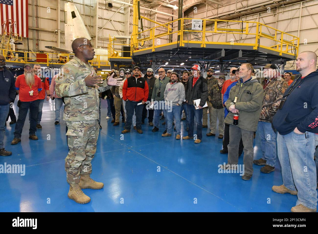 Lt. Gen. Stacey Hawkins, Air Force Sustainment Center commander, talks with members of the 560th Aircraft Maintenance Squadron during his immersion visit at Robins Air Force Base, Georgia, Jan. 27, 2023. The 560th AMXS maintains legacy aircraft, like the C-130 “Hercules” at the Warner Robins Air Logistics Complex. Stock Photo