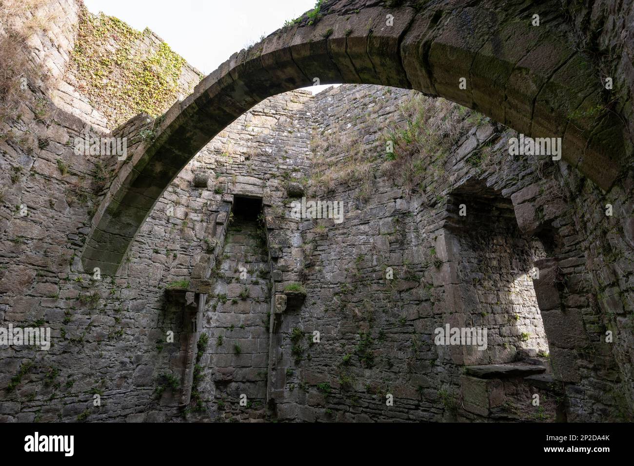 Stone arch inside Beaumaris Castle, Anglesey, North Wales. Stock Photo