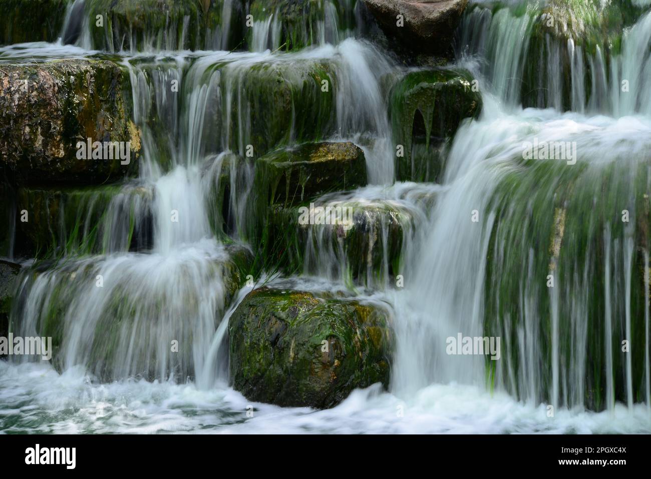 Man made waterfall or cascade with silky water Stock Photo