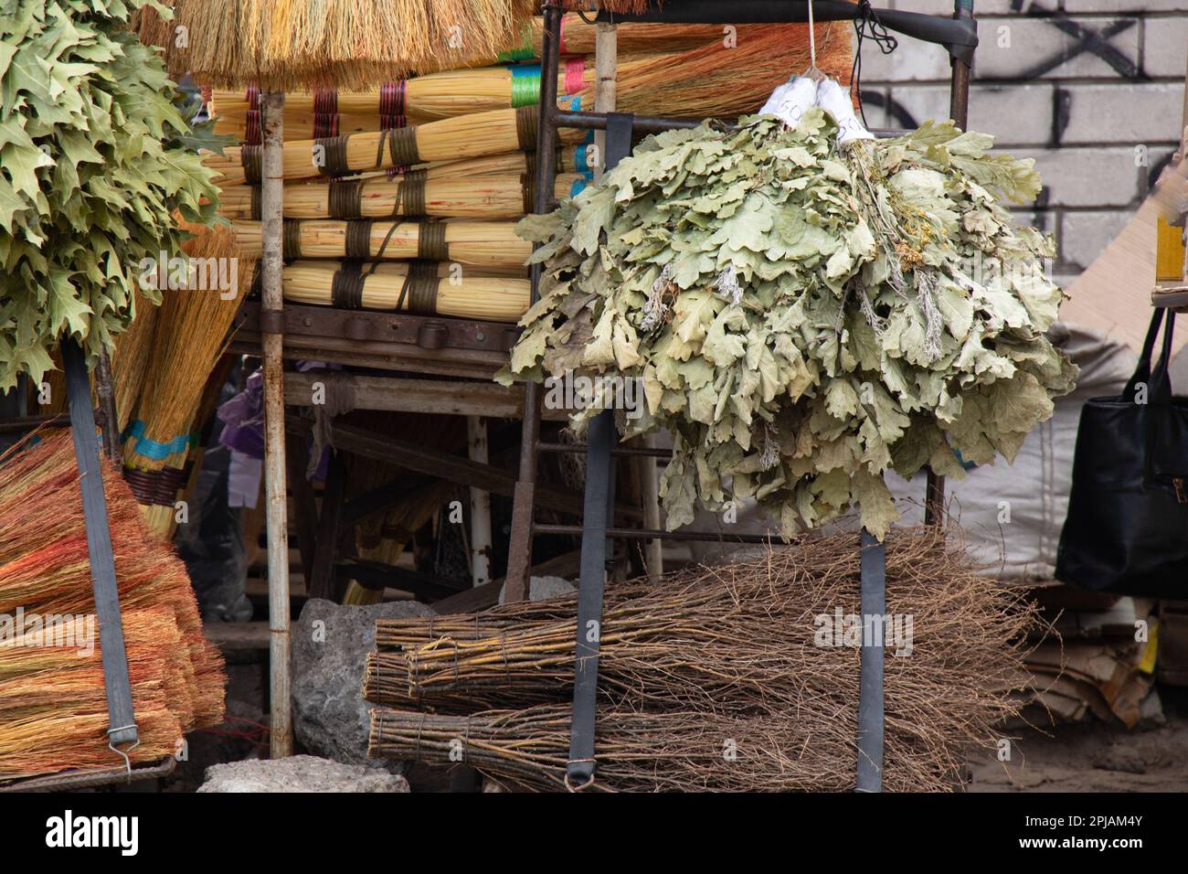 brooms on a window at a bazaar in the city of Dnipro Stock Photo