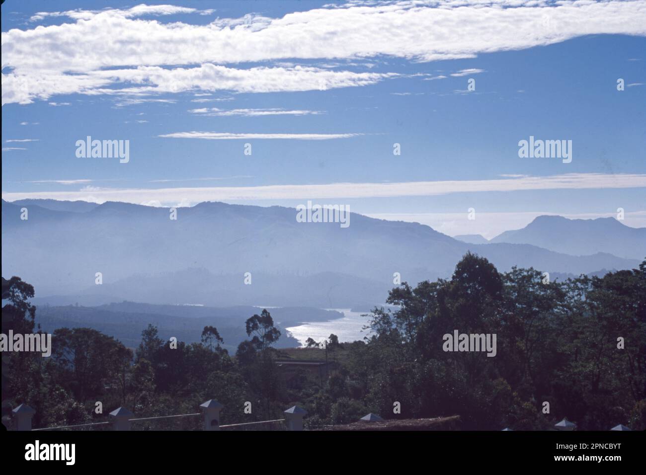 Munnar is a town in the Western Ghats mountain range in India’s Kerala state. A hill station and former resort for the British Raj elite, it's surrounded by rolling hills dotted with tea plantations established in the late 19th century. Eravikulam National Park, a habitat for the endangered mountain goat Nilgiri tahr, is home to the Lakkam Waterfalls, hiking trails and 2,695m-tall Anamudi Peak. Stock Photo