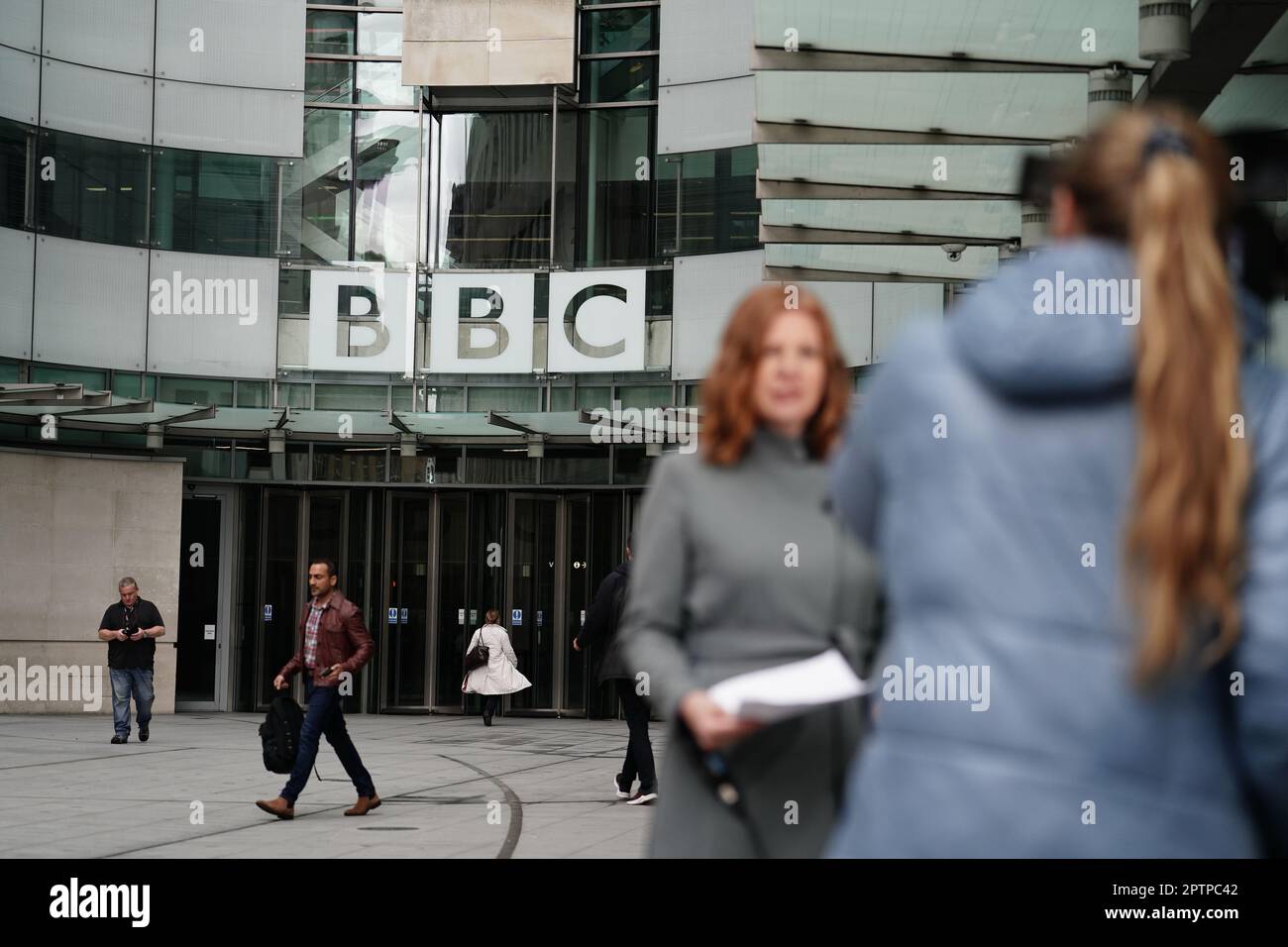 Media outside BBC Broadcasting House in Portland Place, London. The BBC chairman Richard Sharp has announced he is quitting to 'prioritise the interests' of the broadcaster after a report by Adam Heppinstall found he breached the governance code for public appointments. Mr Sharp conceded after Adam Heppinstall KC's report into his appointment found he 'failed to disclose potential perceived conflicts of interest'. Picture date: Friday April 28, 2023. Stock Photo