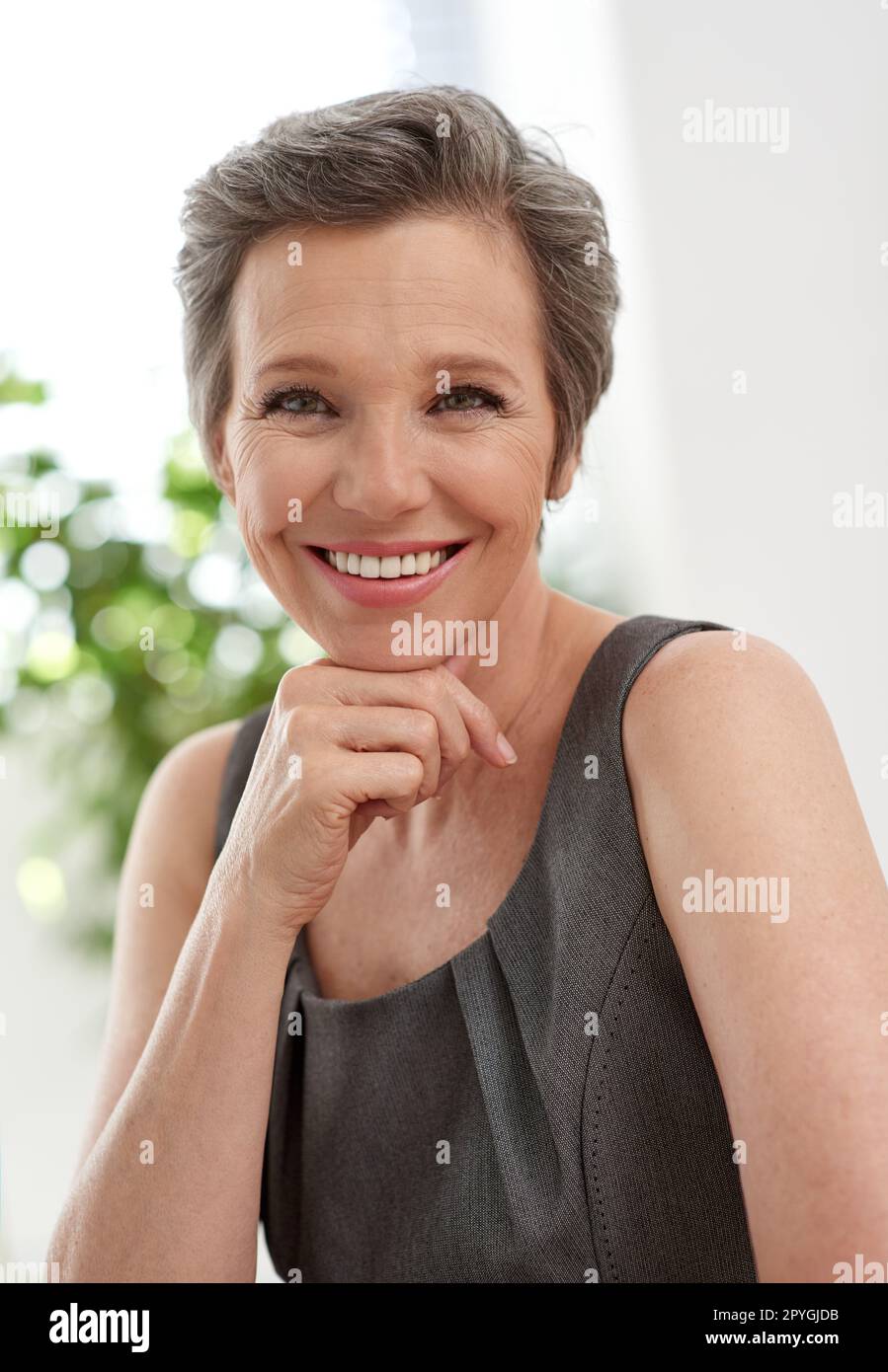 Doing business with a positive attitude. Portrait of a mature businesswoman in the workplace. Stock Photo