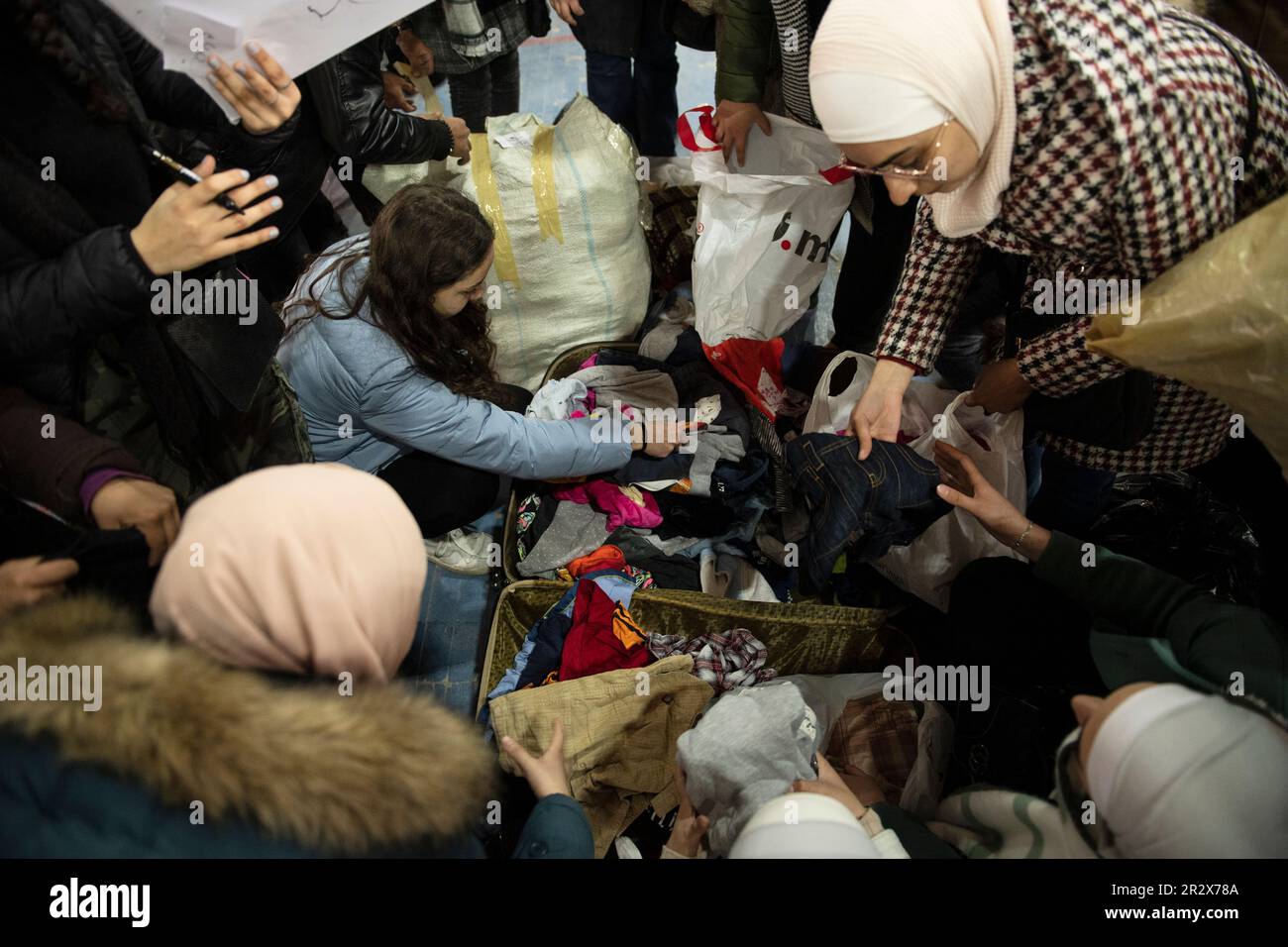 People in Damascus take the action and start collect stuff and aid to help people who affected by the earthquake Stock Photo