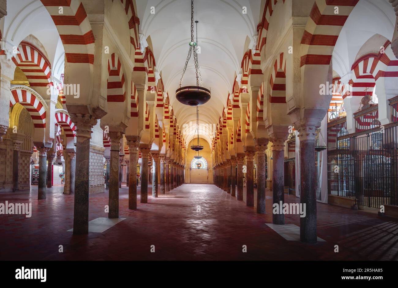 Arches and Columns of Hypostyle Prayer Hall at Mosque-Cathedral of Cordoba - Cordoba, Andalusia, Spain Stock Photo