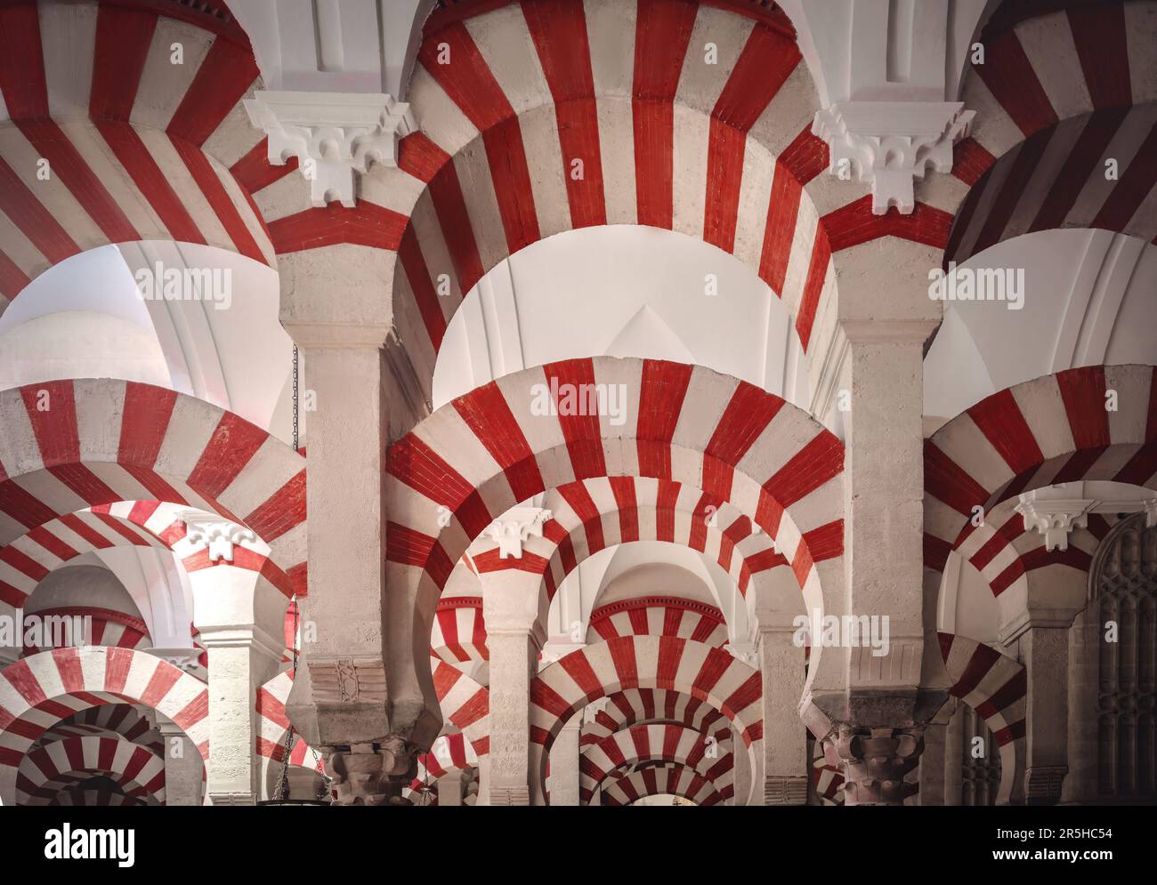 Arches and Columns of Hypostyle Prayer Hall at Mosque-Cathedral of Cordoba (Al-Mansur expansion) - Cordoba, Andalusia, Spain Stock Photo