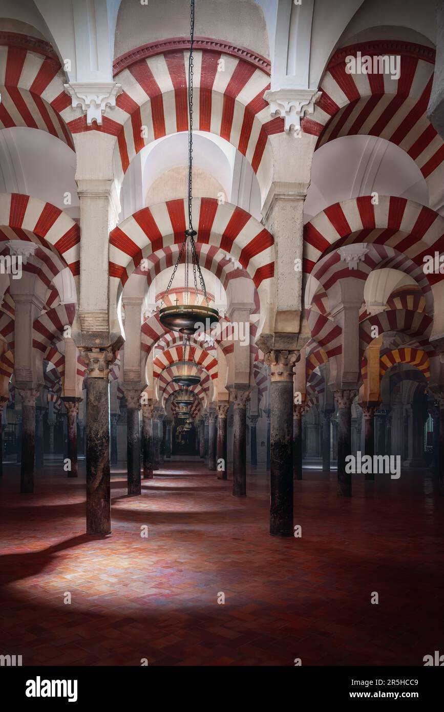 Arches and Columns of Hypostyle Prayer Hall at Mosque-Cathedral of Cordoba - Cordoba, Andalusia, Spain Stock Photo