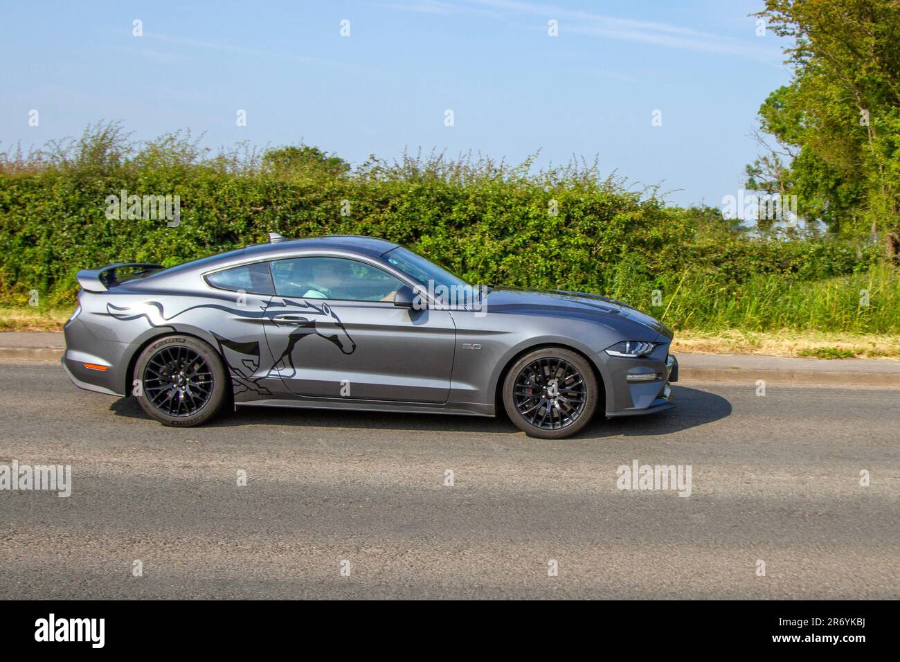 2022 Grey Ford Mustang GT Auto Pony Car with illustration; Classic & Performance Motor Show at Hoghton Tower; Supercar Showtime June 2023 Stock Photo