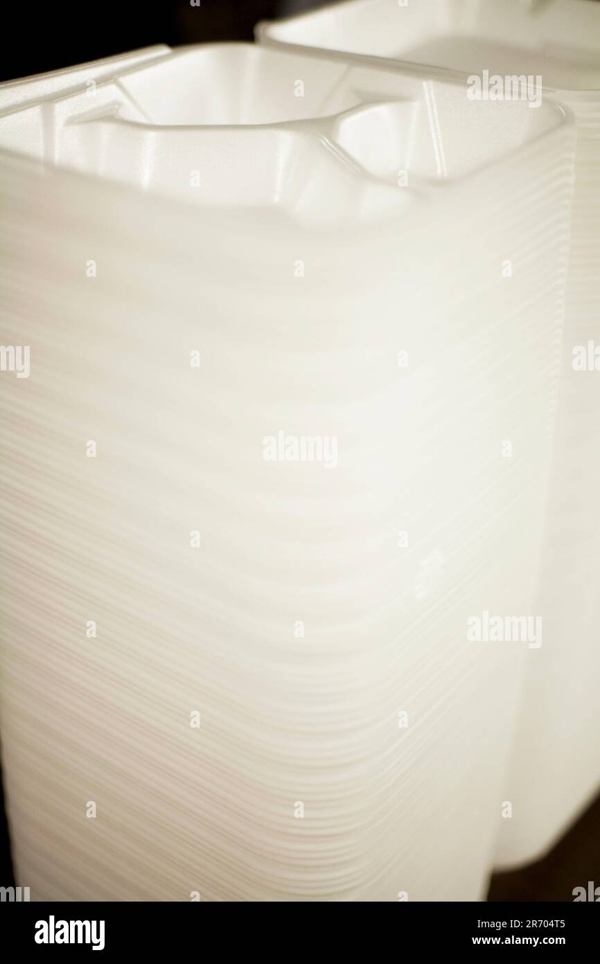 Detail of Styrofoam food trays stacked together at a San Francisco soup kitchen. Stock Photo