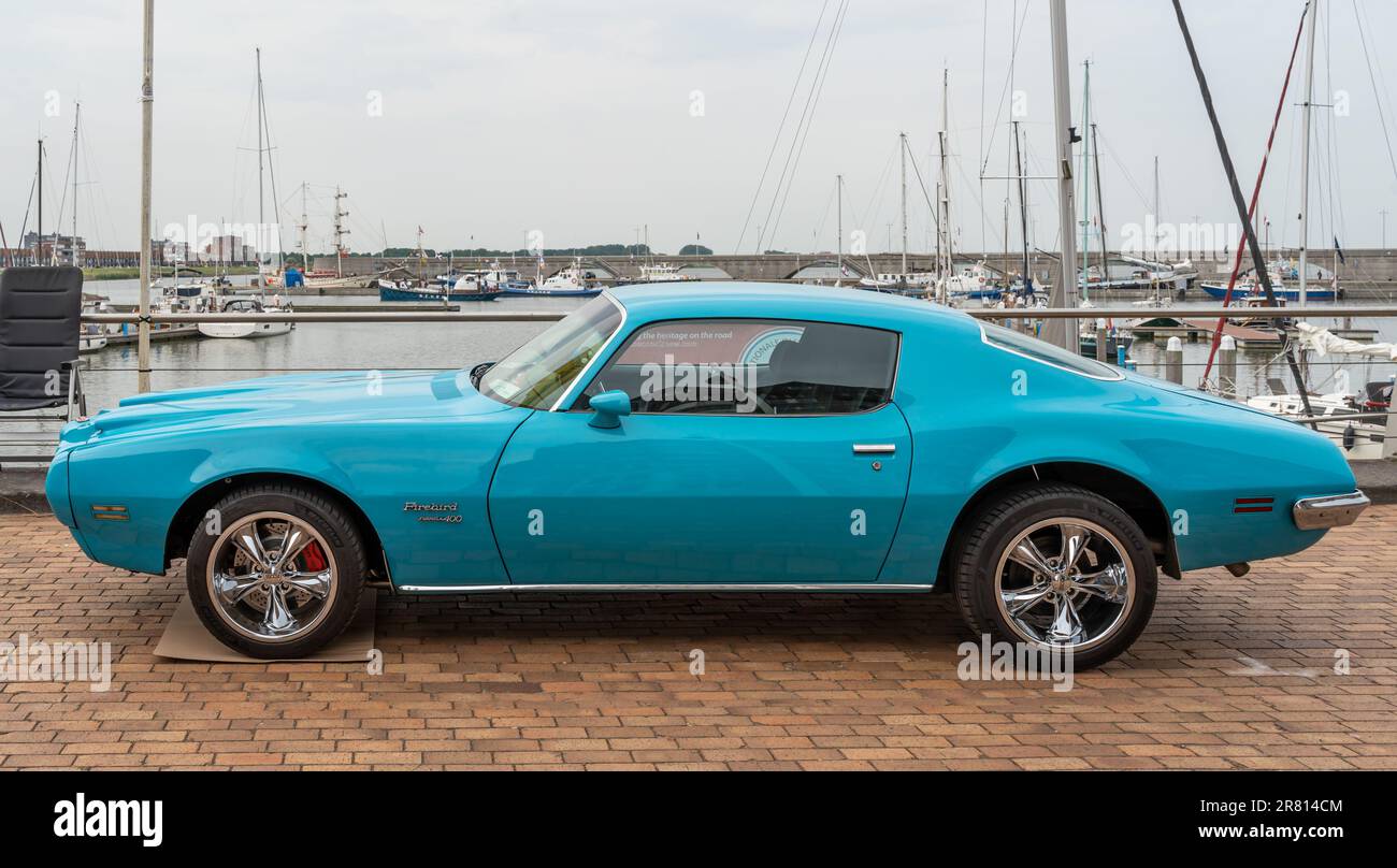 Lelystad, The Netherlands, 18.06.2023, Side view of retro car Pontiac Firebird Formula 400 from 1970 at The National Oldtimer Day Stock Photo