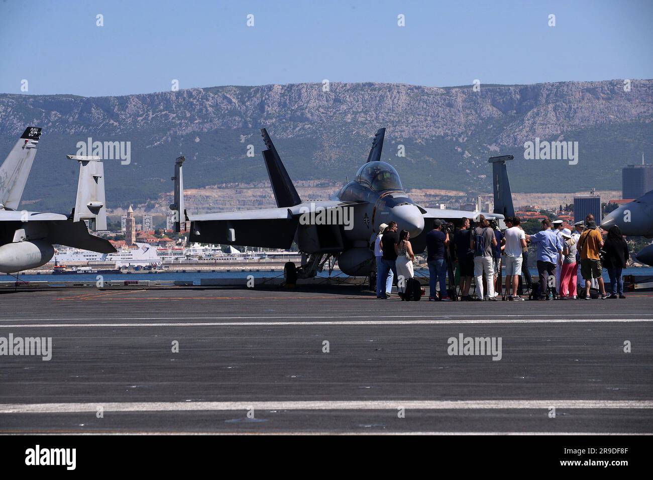 Split, Croatia. June 26, 2023. The pride of the American Navy, the most modern nuclear-powered aircraft carrier 'USS Gerald R. Ford' sailed into Split this morning. The huge ship, which attracts the attention of the people of Split and tourists, is the largest warship in history. It is more than 330 meters long and 76 meters high, like a solid skyscraper, with 25 decks. Construction cost 12.8 billion dollars, and another 4.7 billion was spent on research and development.  Photo: Zvonimir Barisin/PIXSELL/Alamy Live News Stock Photo