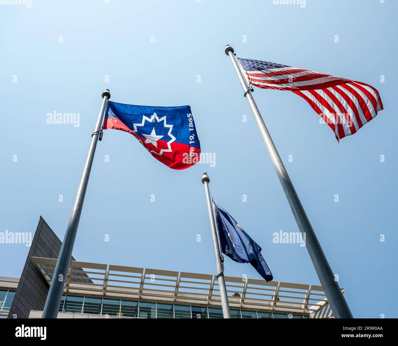 NASA HQ Juneteenth Flag Raising Ceremony. The Juneteenth flag is seen waving in the wind during a flag raising ceremony in recognition and celebration of Juneteenth, Thursday, June 15, 2023, at the Mary W. Jackson NASA Headquarters building in Washington. Stock Photo